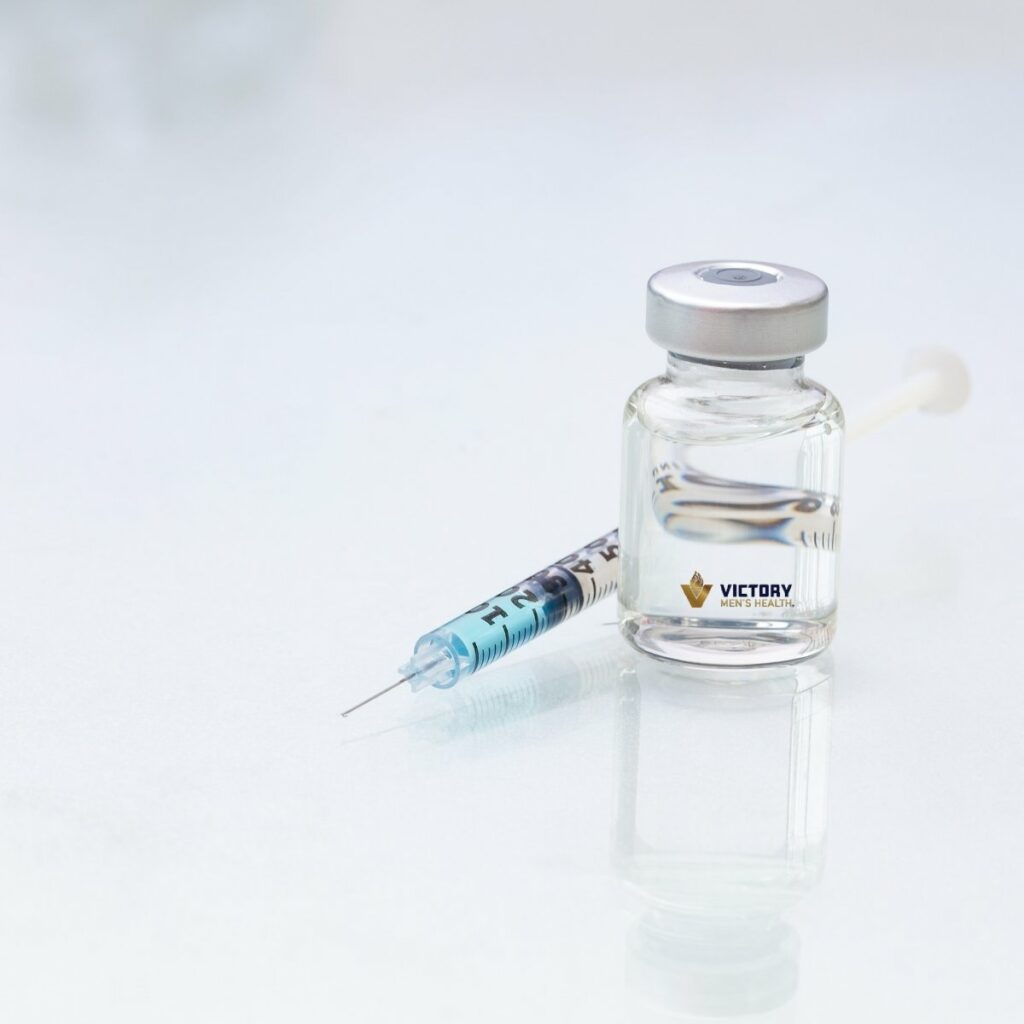 Bottle of testosterone and injection needle